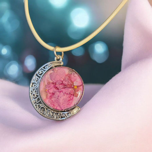 Vintage style Moon Spinner with Real Flowers on each side of Pendant
